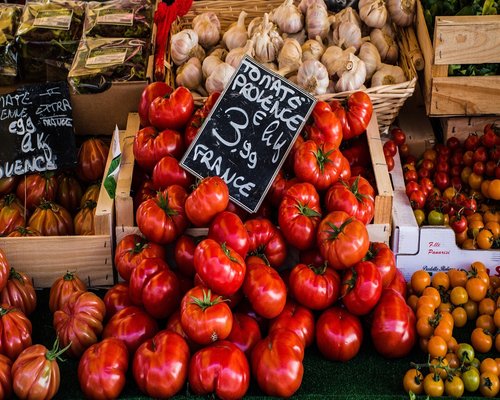 A counter filled with fresh local vegetables purchased at an open market stall in Poznań