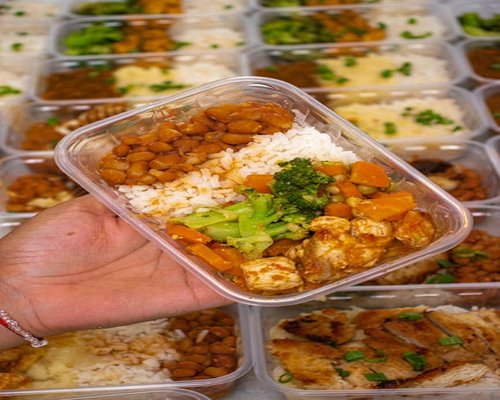 A healthy home-cooked lunch prepared neatly inside a container box